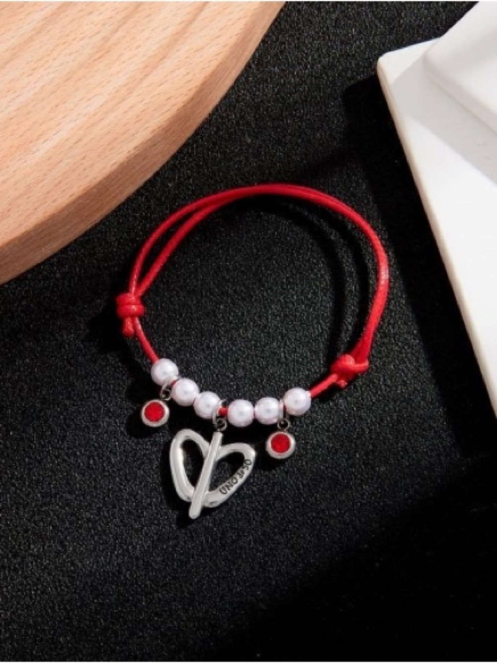 UNO de 50 Red Cord Bracelet with Heart Charm and Pearl Beads